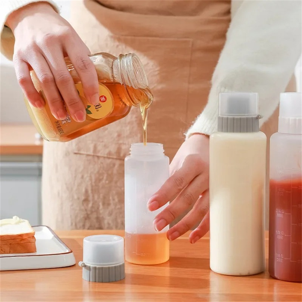 زجاجات ضغط للتوابل بخمس فتحات  - مراجعة Condiment Squeeze Bottle وسعره